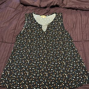 Sleeveless fun summer top casual or business appropriate